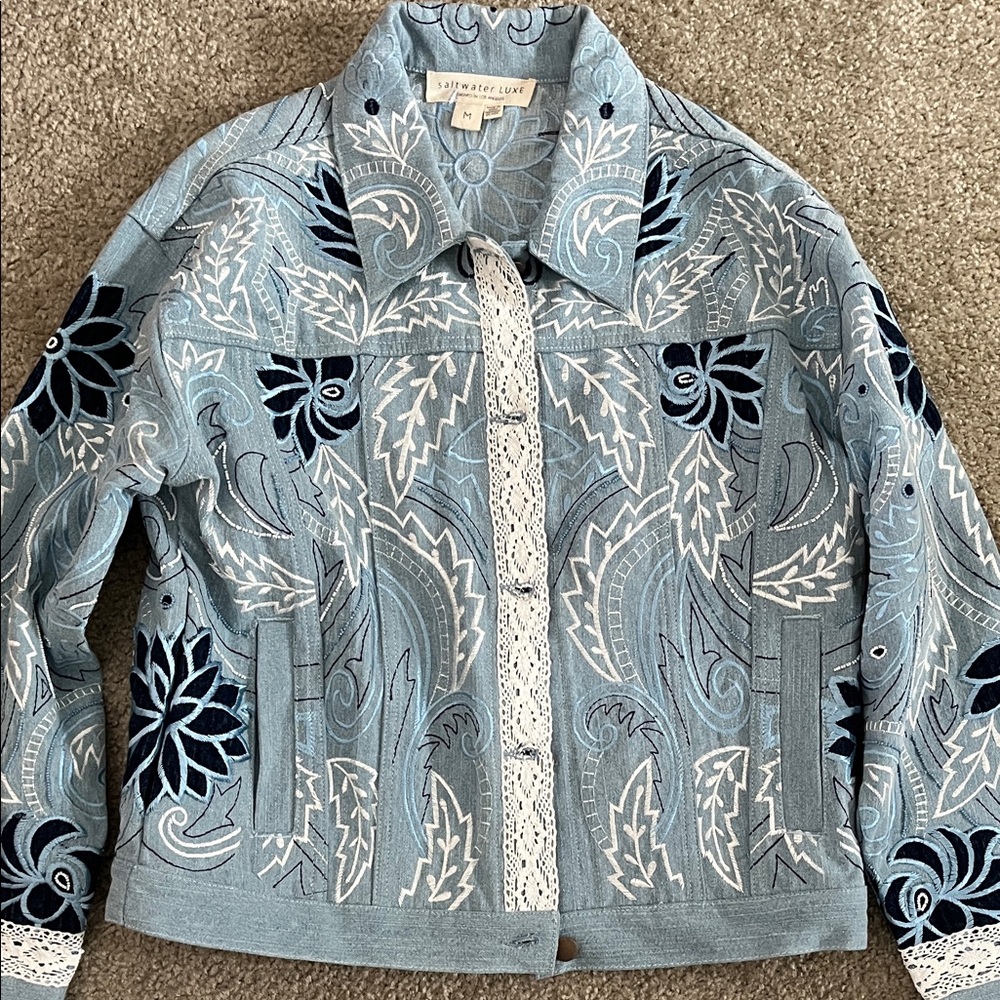 Beautiful never worn machine embroidered jean jacket.
